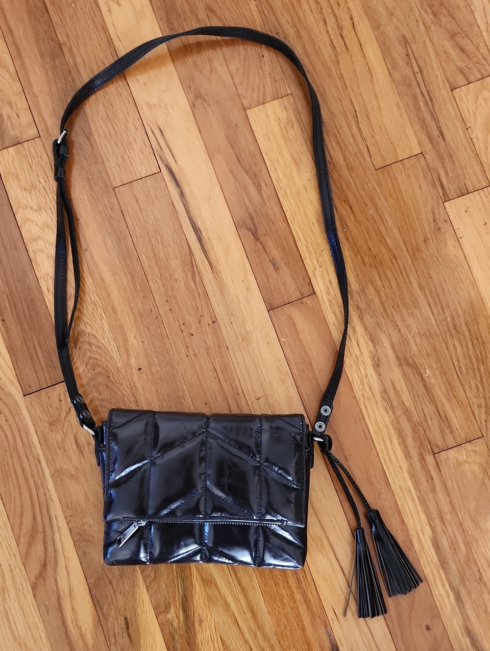 Patricia Nash Quilted Oil-Waxed Black Leather Crossbody Bag with Tassel